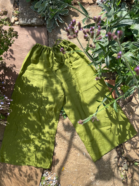 Moss green linen women’s wide legged trousers (42”)