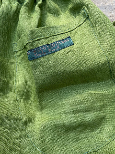 Moss green linen women’s wide legged trousers (42”)