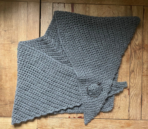 Grey hand crocheted pure wool and alpaca shawl with hand forged cloak pin.