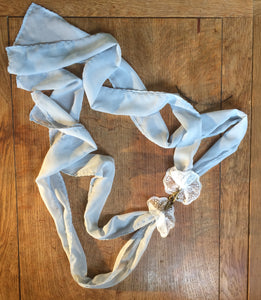 Dusky blue and white lace hand restraints