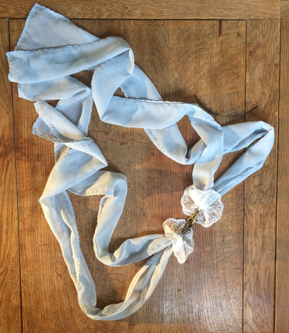 Dusky blue and white lace hand restraints