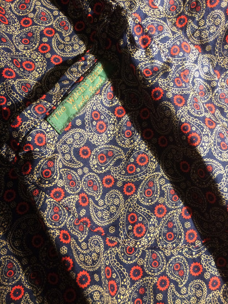 Navy paisley print cotton women’s pinafore dress (40” bust)