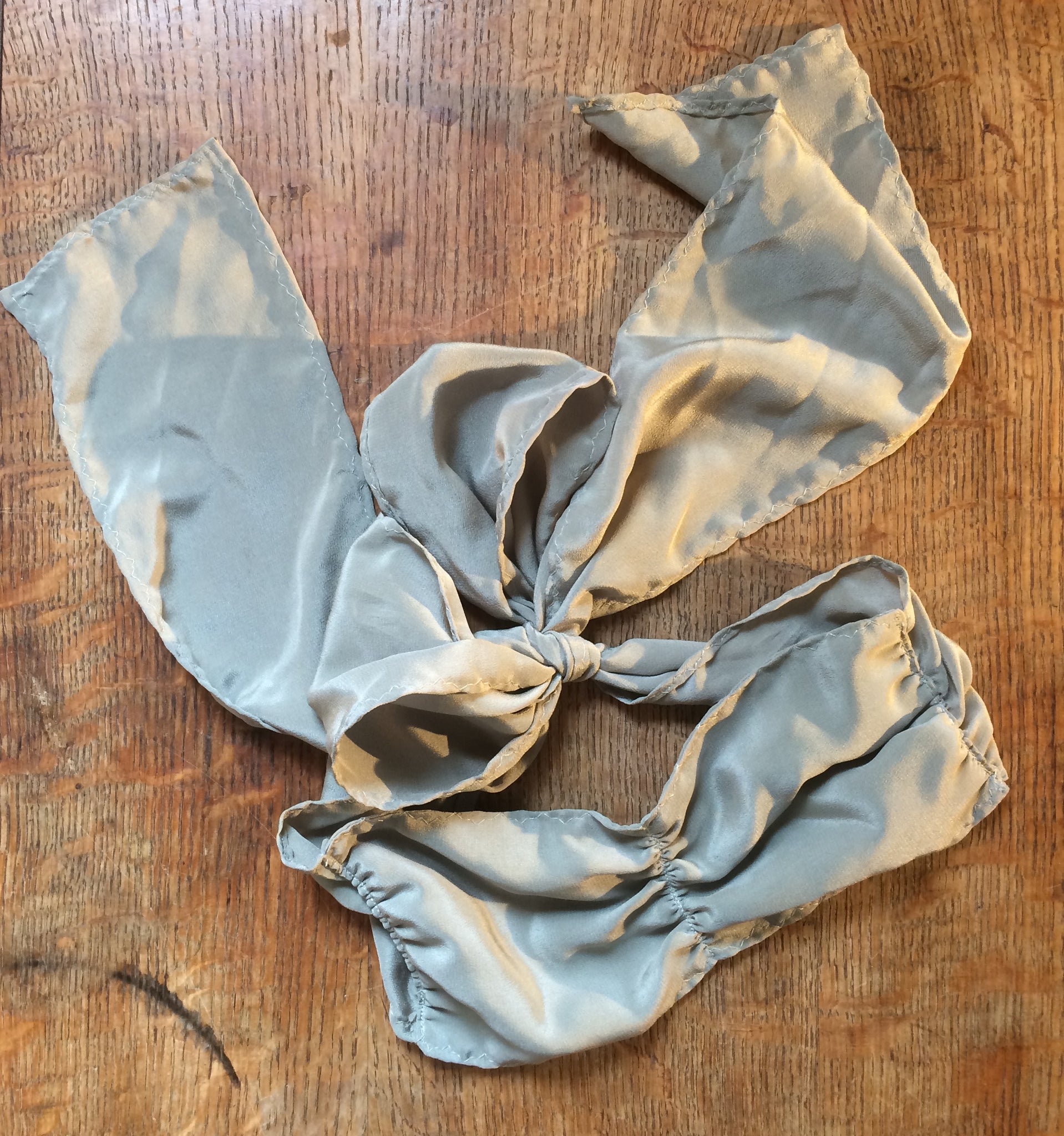 Lichen green pure silk blindfold.
