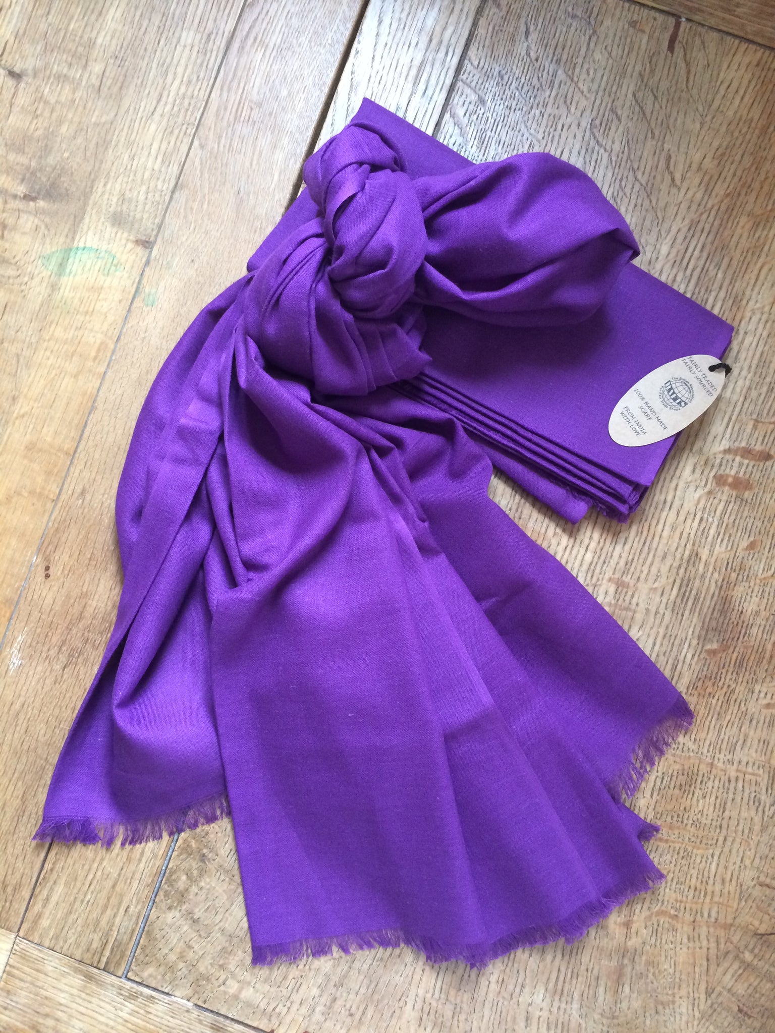 Dark purple fairtrade organic cotton shawl.